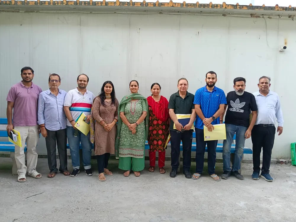 Training group photographed together at the end of a farm visit session